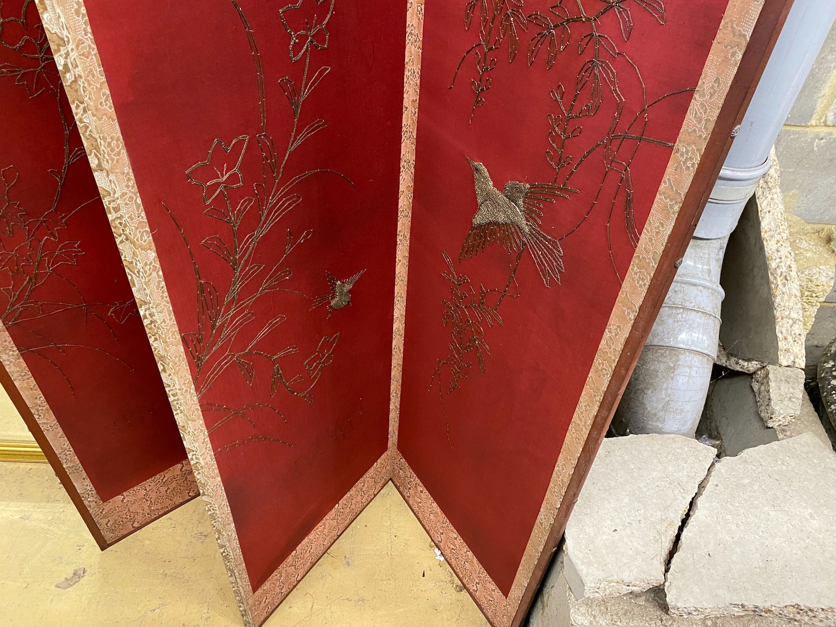 An embroidered Chinese style four fold dressing screen, each panel width 48cm, height 170cm